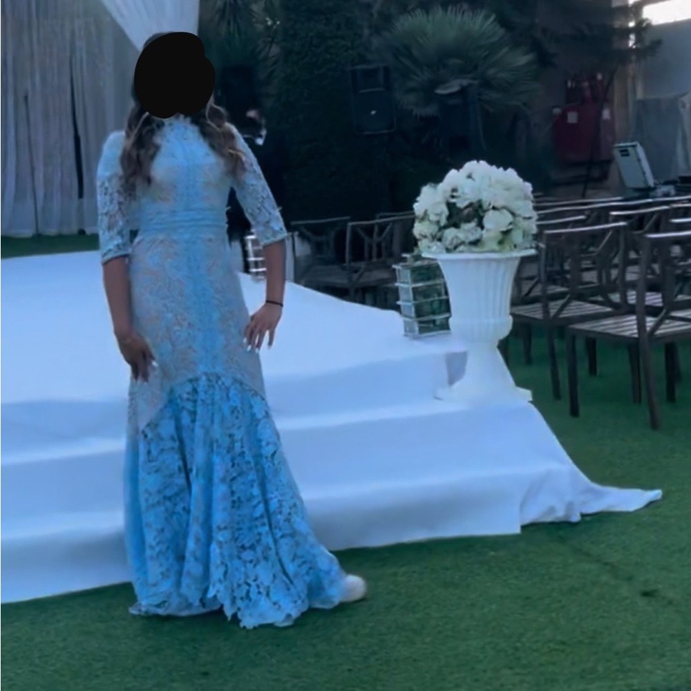 Light blue gown fully lined